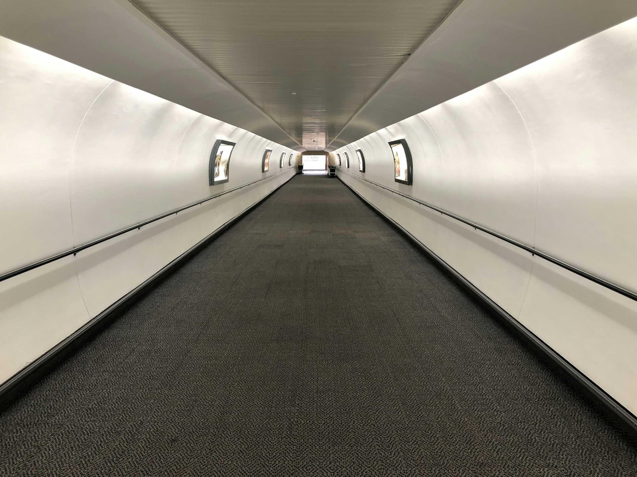 An image of a road extending infinitely into the distance, representing the 'Unlimited Level' depth required to overcome bottlenecks in multi-level IB structures.