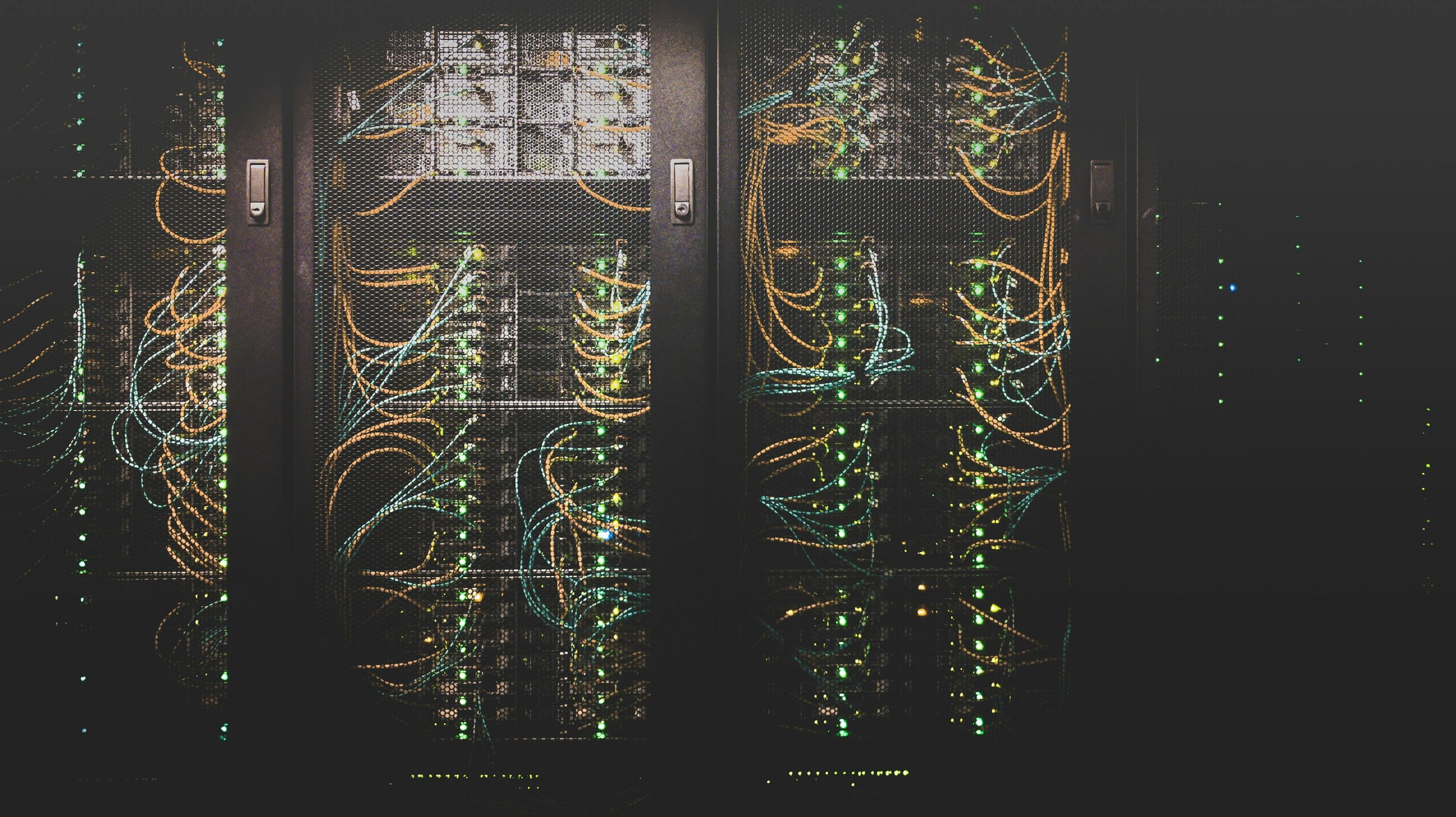 A specialized server rack with numerous blinking lights and intricate network cabling, symbolizing the millisecond execution speed critical for preventing slippage in algorithmic trading.