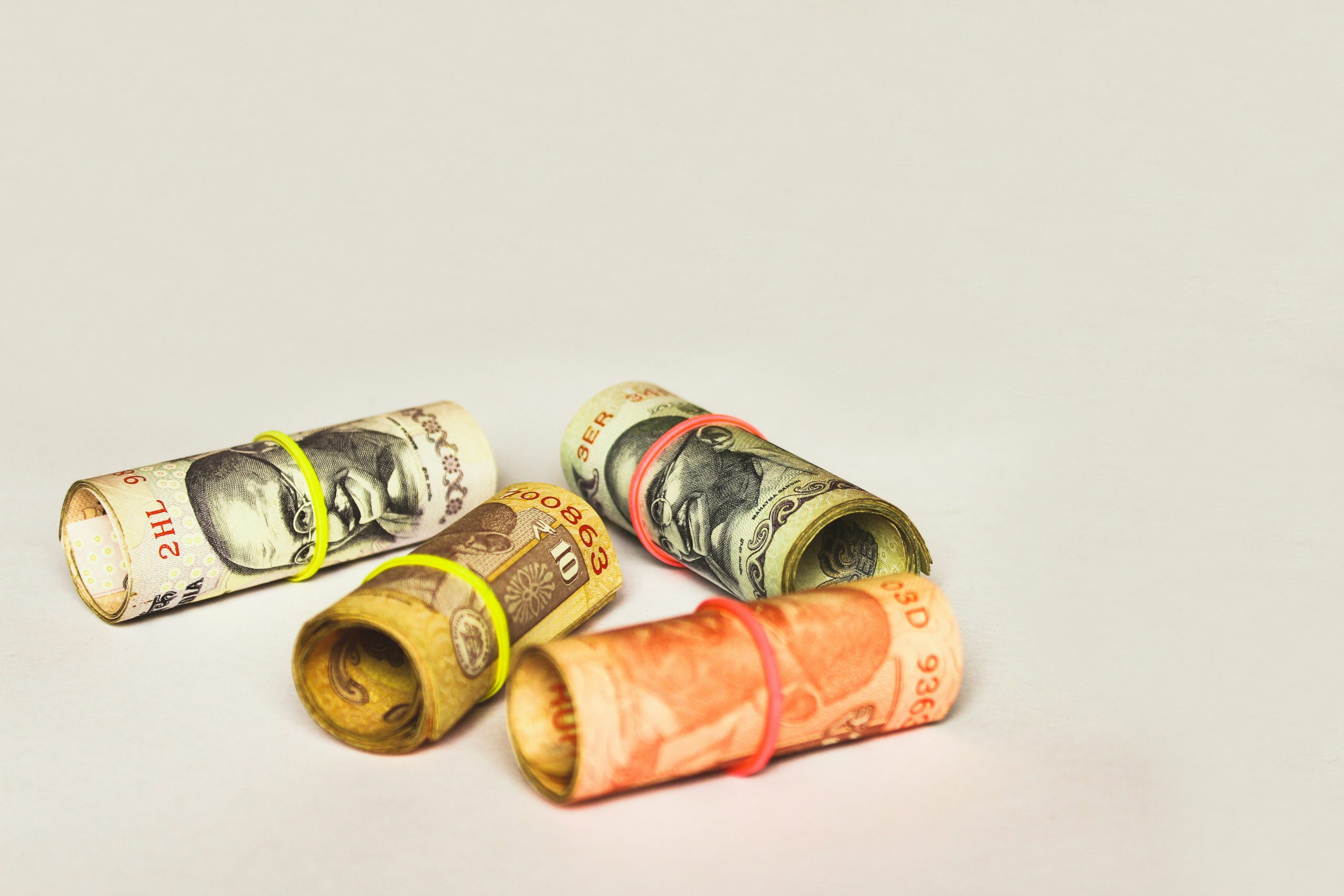 Hybrid Fee Structure Interlocking gears representing a hybrid fee structure, illustrating diversified income streams for master traders.