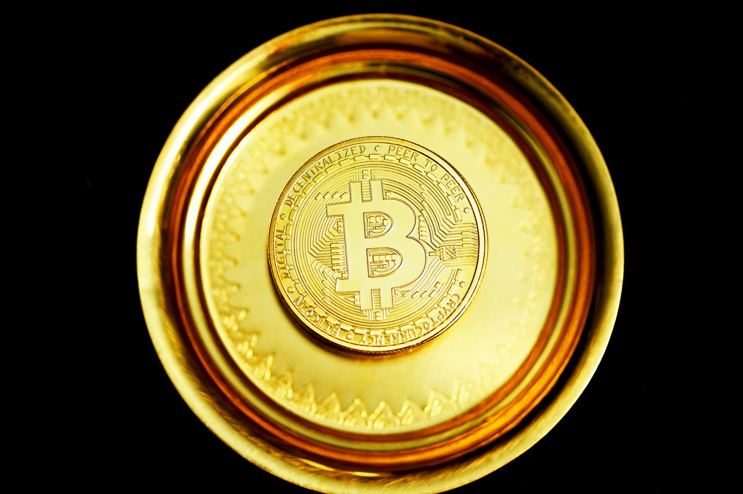 Bitcoin represented as both a scarce digital gold asset and a flexible, programmable cryptocurrency, reflecting its evolving use cases in 2026.