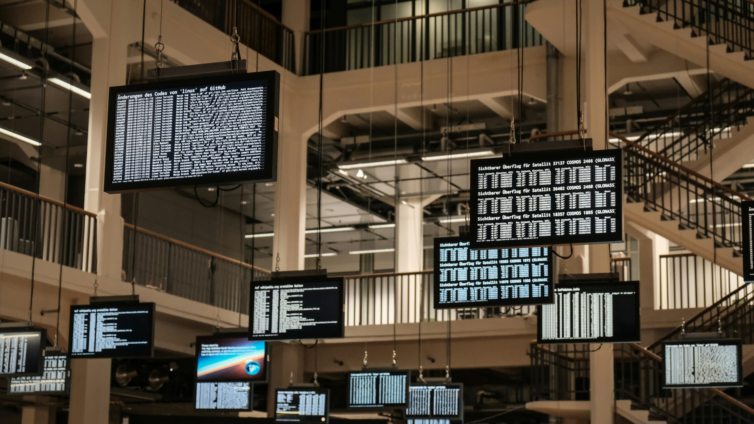 Screens displaying diverse financial instruments like Forex, Crypto, and ETFs, symbolizing cTrader's technical superiority in multi-asset trading and execution speed.