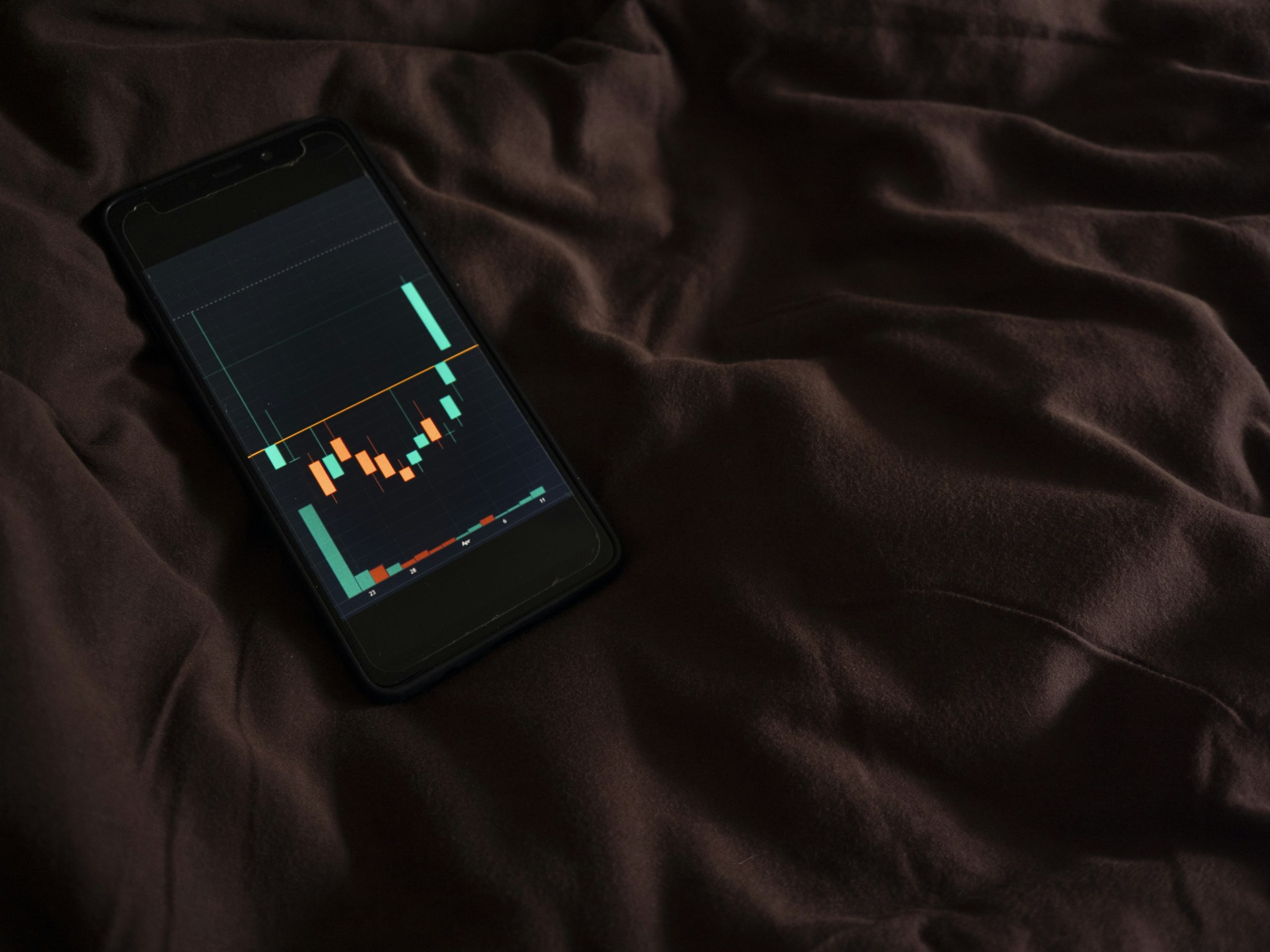 Social Copytrading Interface A person's hands interacting with a tablet displaying a social copytrading leaderboard, highlighting the modern approach to automated forex without coding.