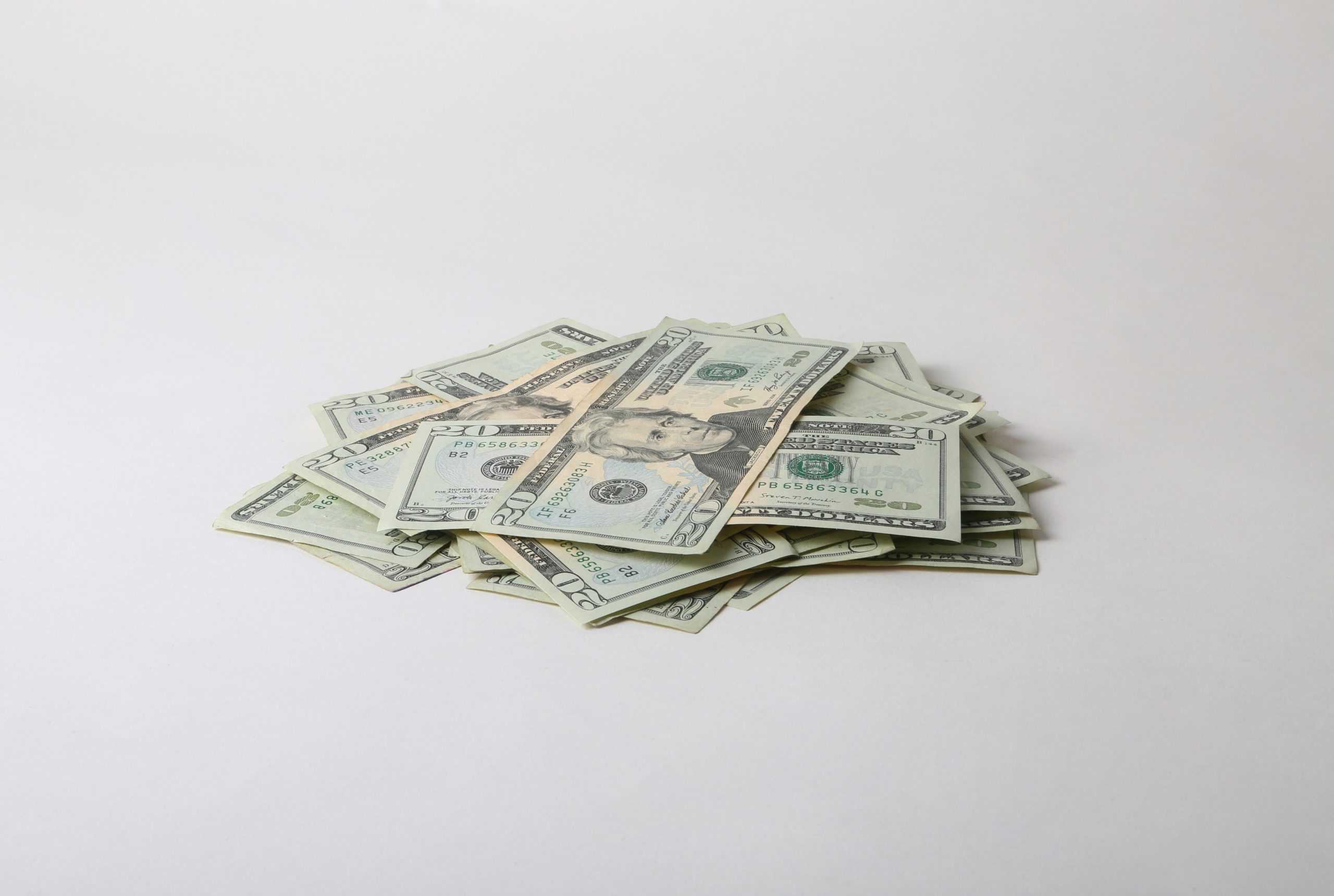 Instant Commission Payouts A hand holding a phone showing instant payout confirmation, illustrating how Coinstrat Pro provides immediate access to commissions for reinvestment.