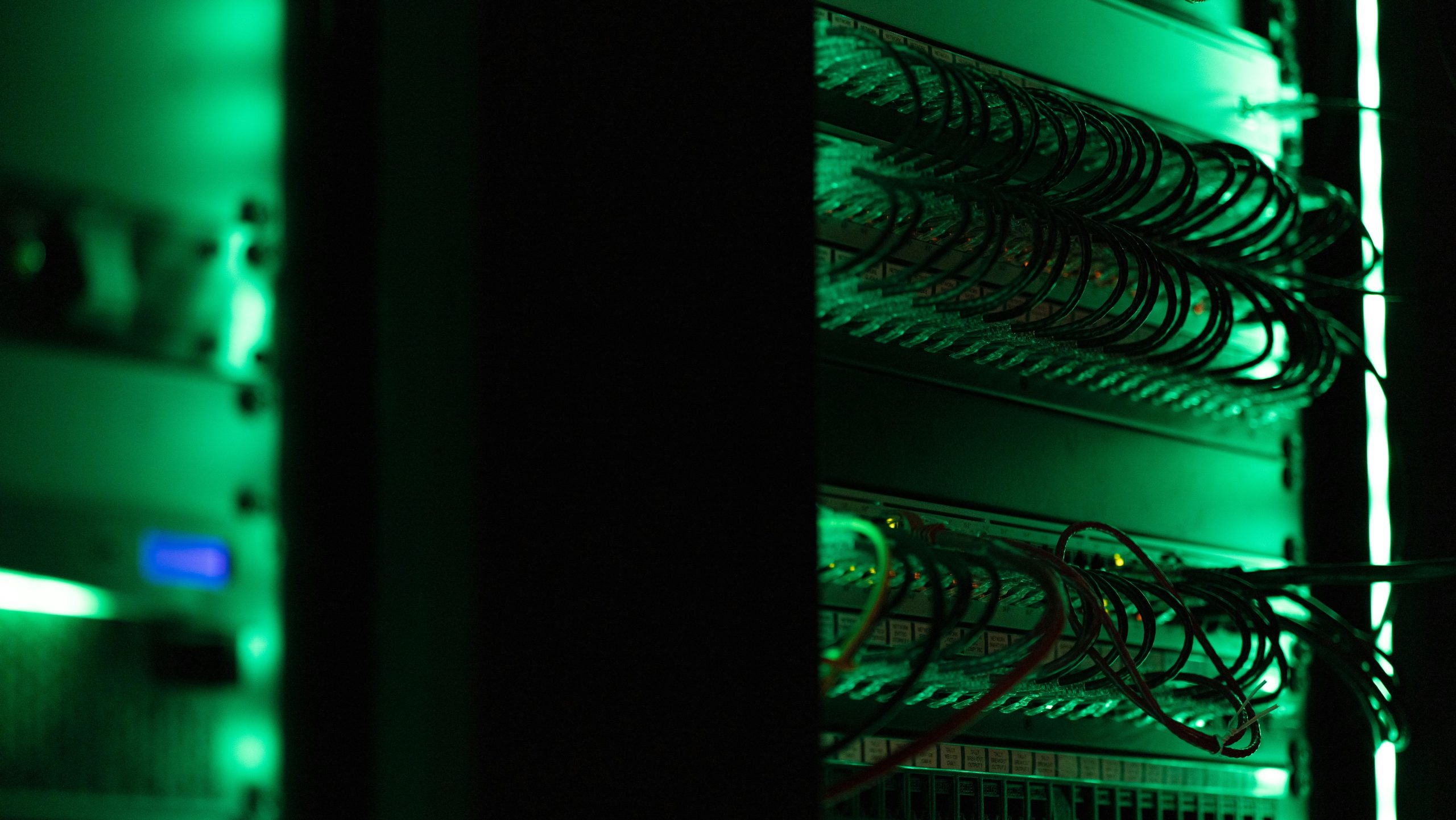 Server-side Social Trading Rows of servers with blinking lights in a data center, symbolizing the robust infrastructure supporting server-side social trading platforms.