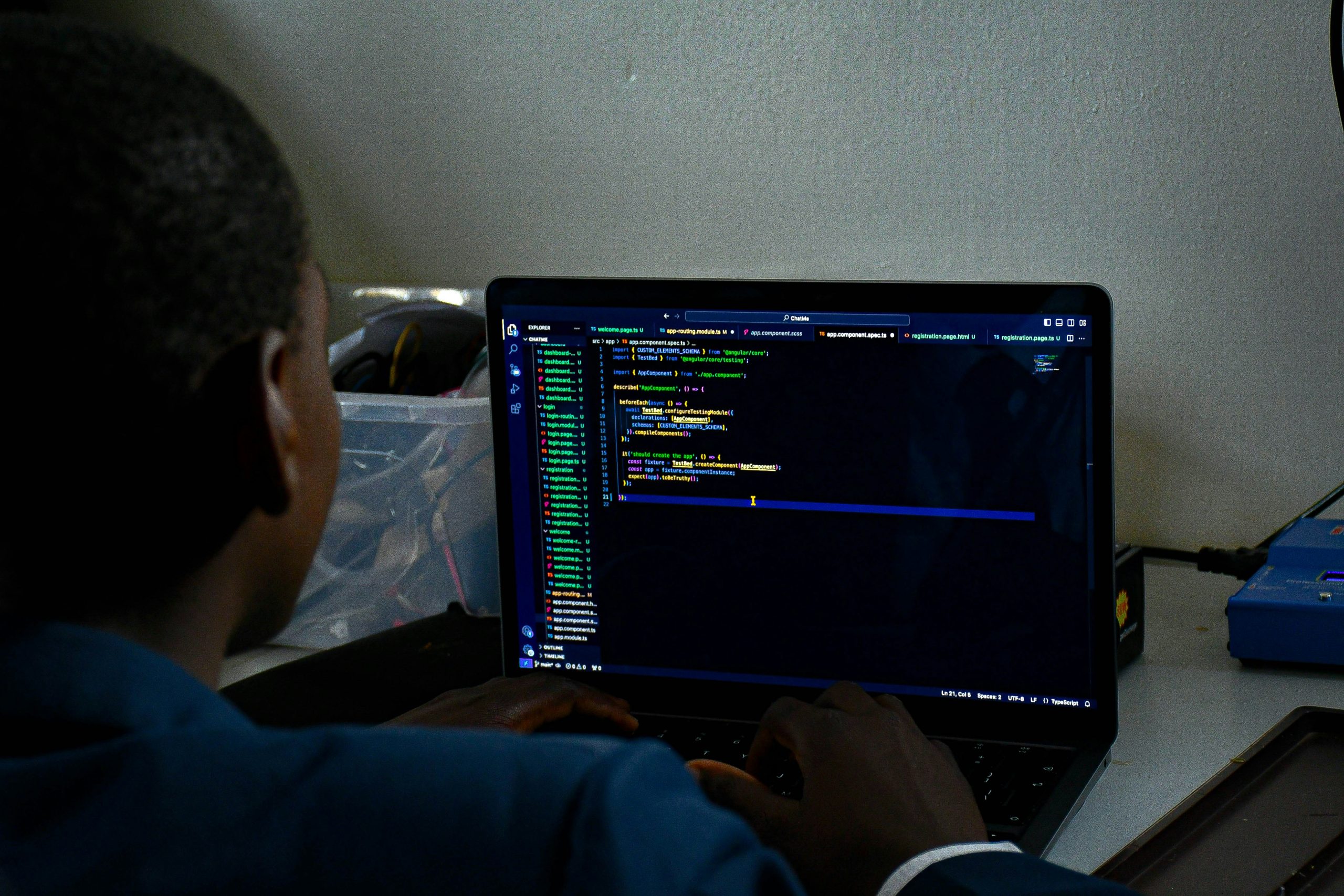 A person configuring a cTrader signal provider account on a laptop, demonstrating the technical setup for becoming a signal provider.