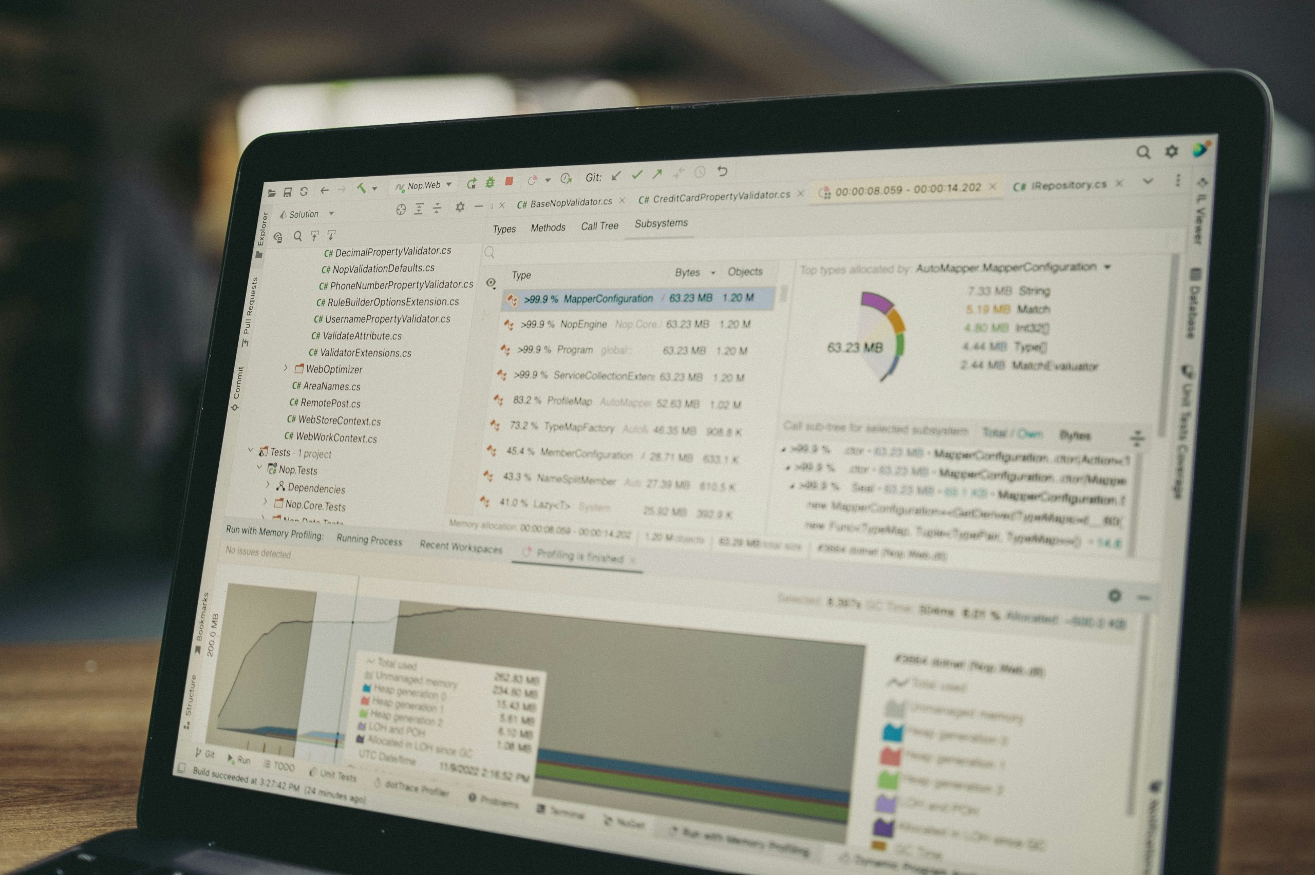 A user's hands navigating a professional IB dashboard, showcasing real-time AUM, custom markups, and performance metrics for an IB business.