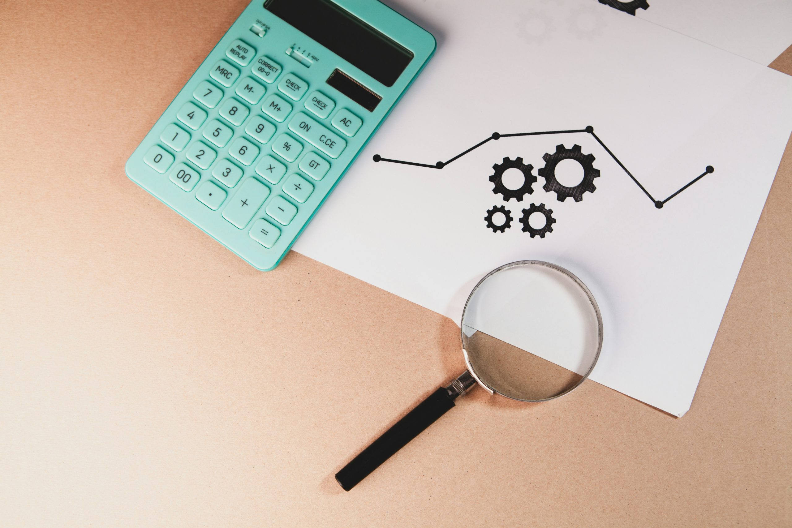 Analyzing ROI and Drawdown A person analyzing complex financial data on a computer, highlighting the importance of balancing ROI with risk in copy trading.